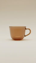 Handcrafted glass teacup in spiced chai brown