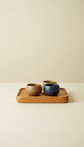Artisanal wooden tea tray with trio of cups